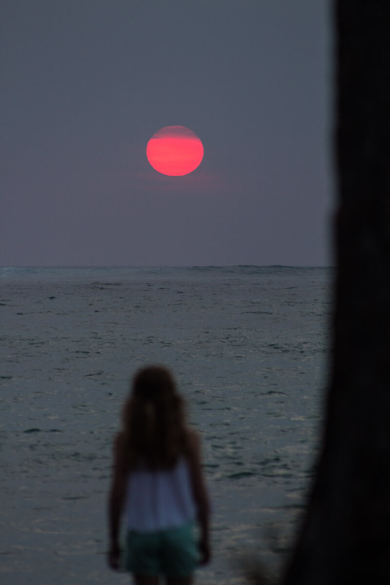 Mesmerized by the pink sunset at Lava Lava Beach Club, Waikoloa, Hawaii