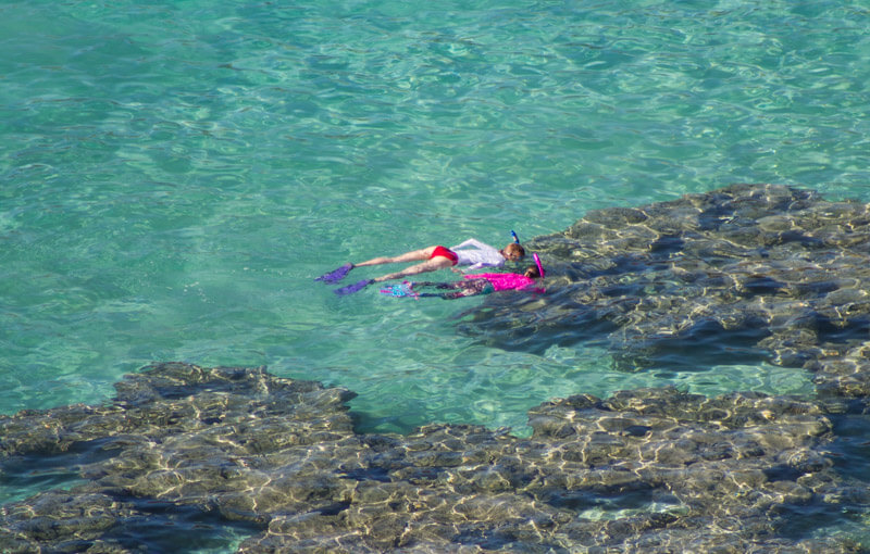 Snorkeling at Hanauma Bay - one of the best things to do in Hawaii with kids