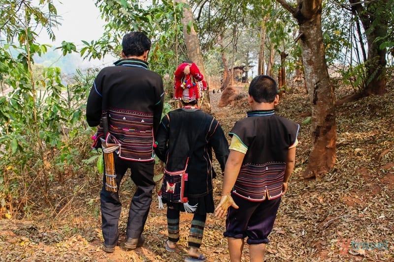 walking in the mountains with Akha hill tribe people 