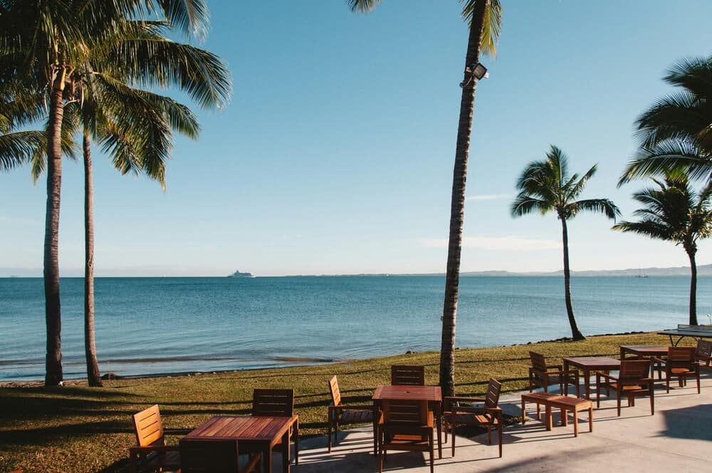 seating area on edge of beach