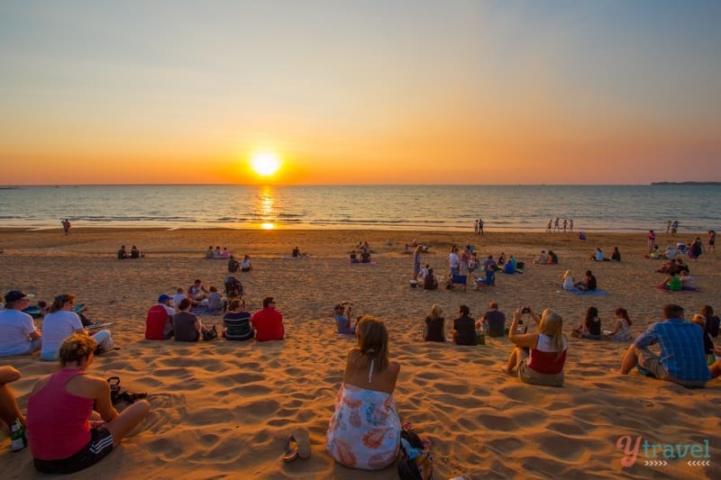 woman watching Sunset at Mindil Beach - Darwin, Australia