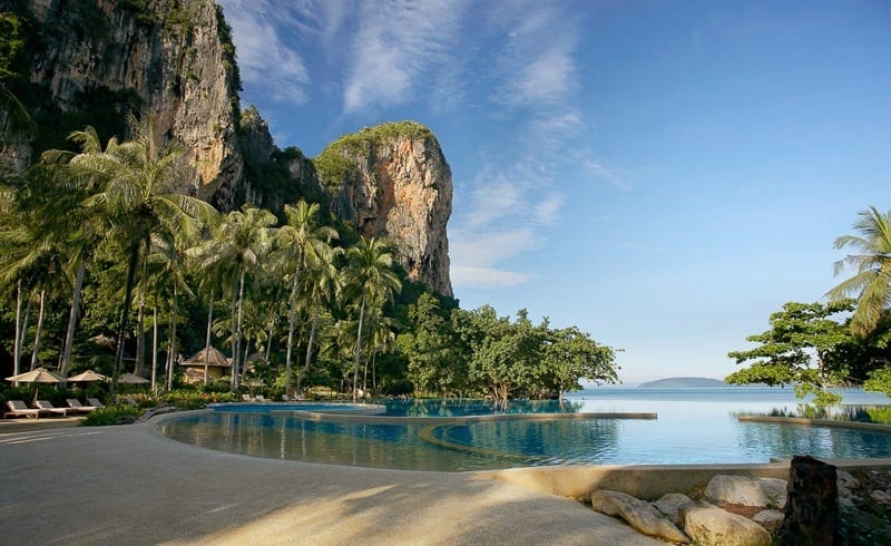 swimming poool of Rayavadee Railay Beach underneath limestone cliffs