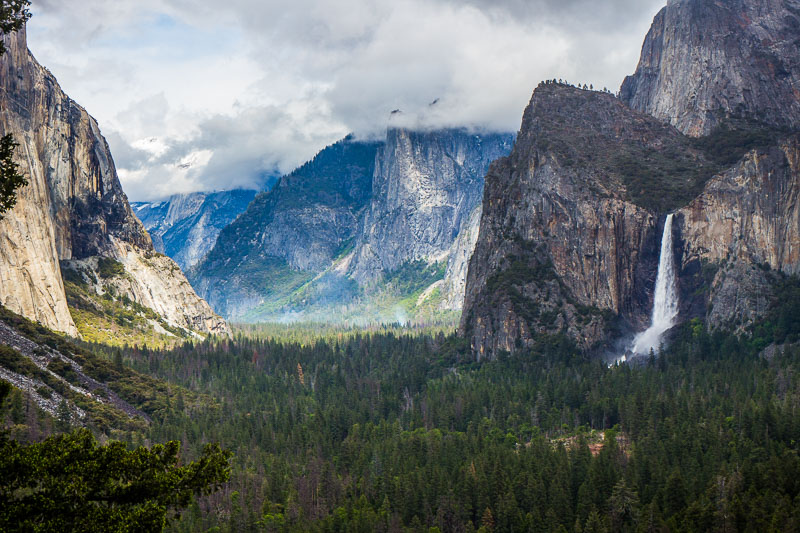 waterfalls cascading down cliffs into yosemite valley