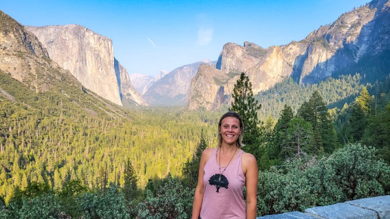 woman posing in front of Tunnel View Yosemite National Park