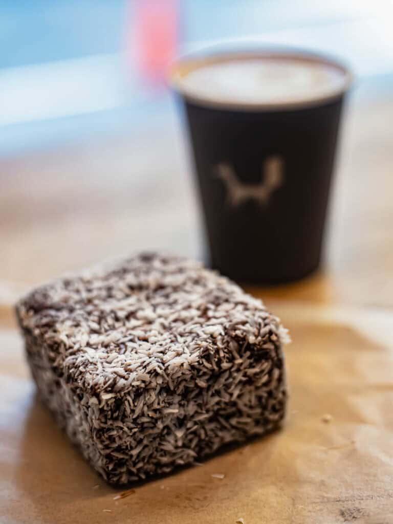 lamington and coffee on table at black fox