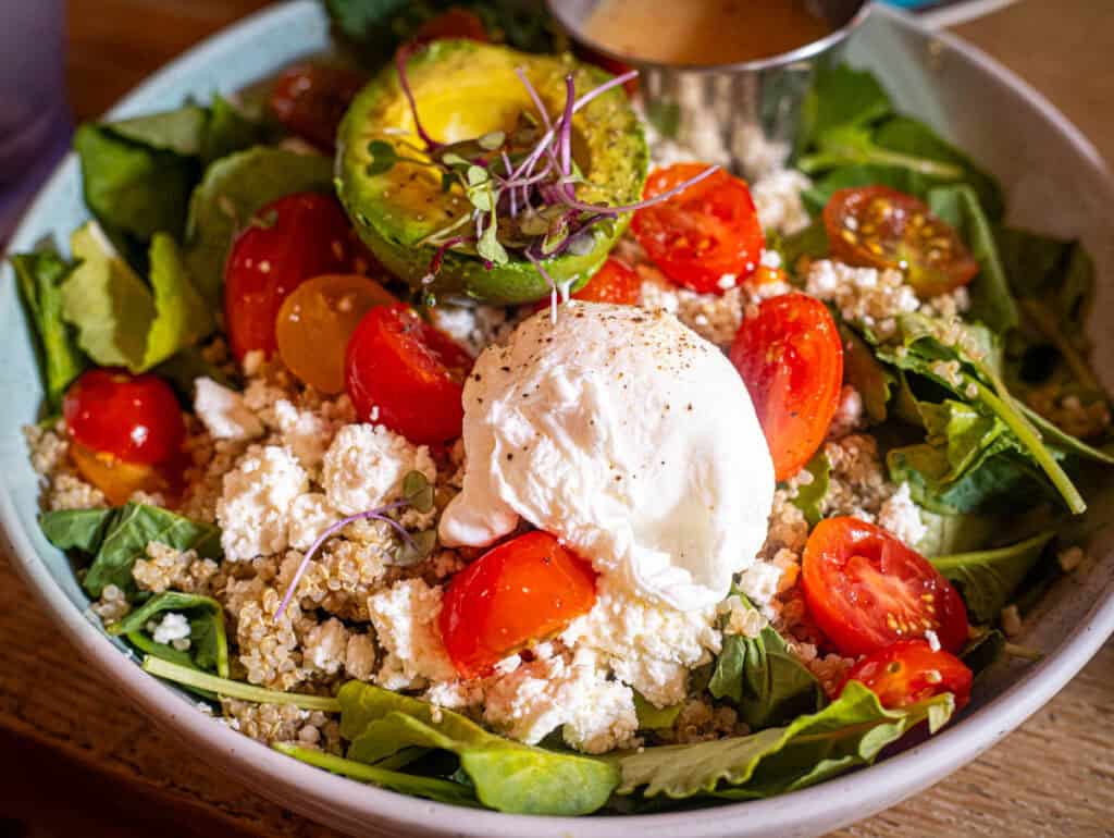 salad bowl with poached egg