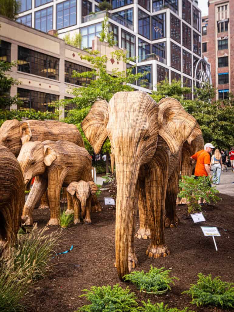 row of bamboo elephant sculptures 