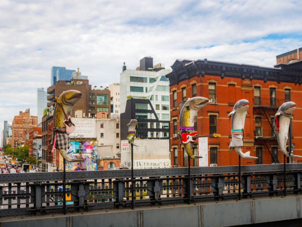 fish sculptures on highline with NYC skyline in the background