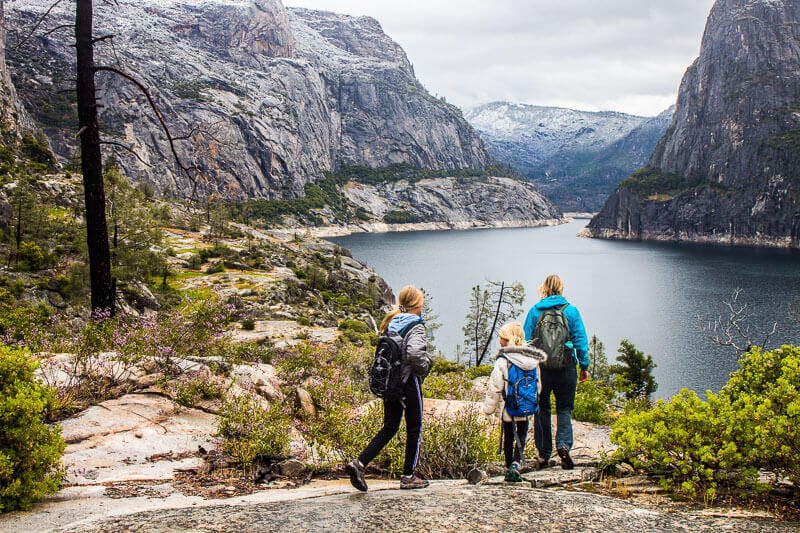 people hiking on mountains in yosemite