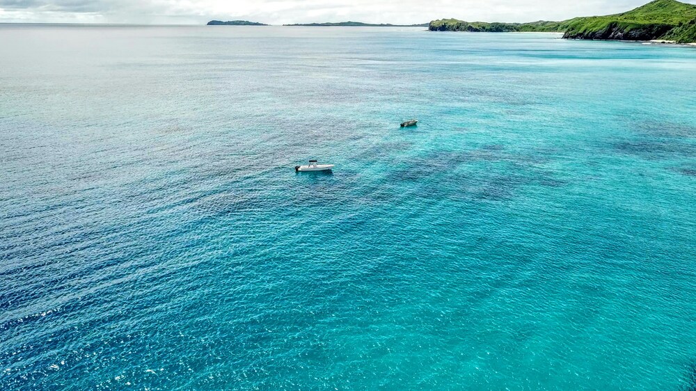 boats on ocean in fiji