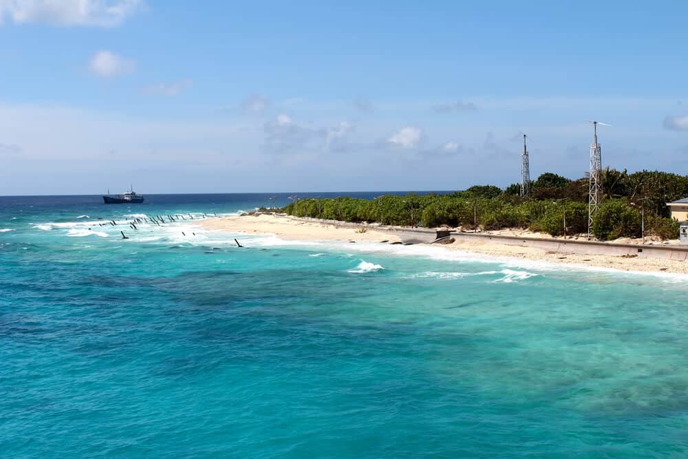 sandy beach with waves lapping