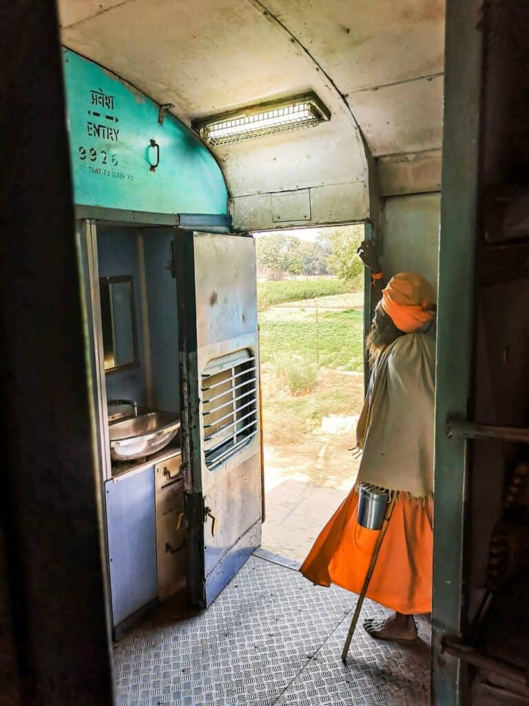 indian man on train in india