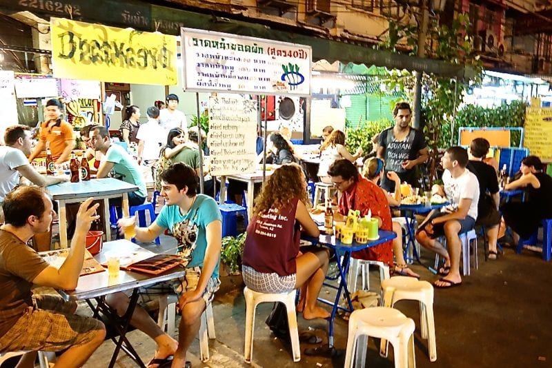 people eating on the streets in bangkok