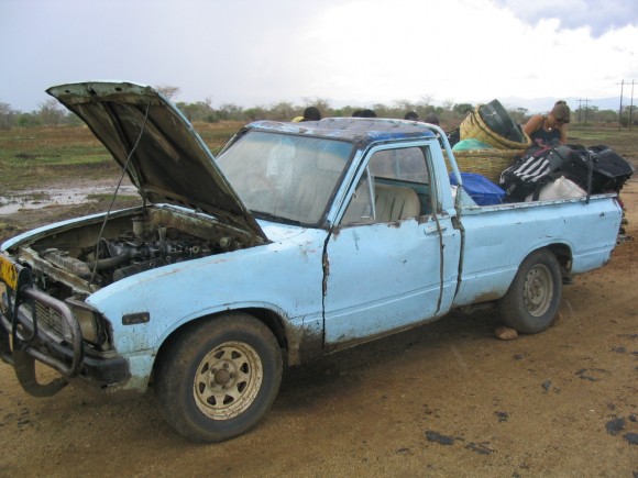 pick up truck on dirt road in africa