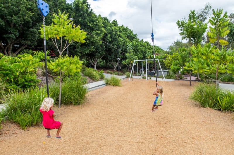 kids on swings at park