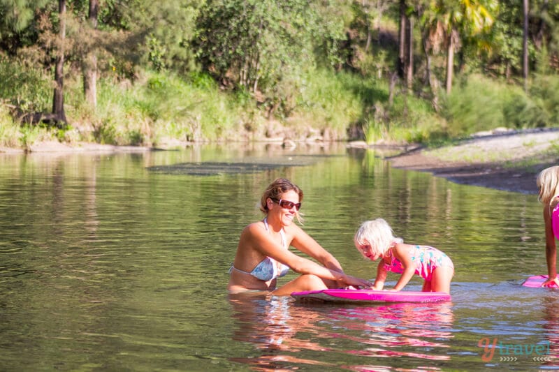 people swimming in water