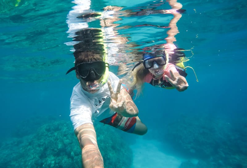 people snorkeling in the ocean