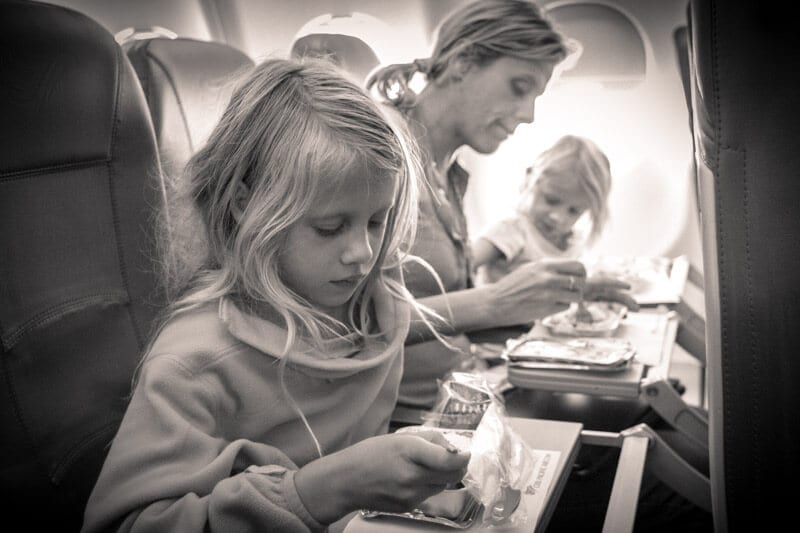 family eating plane food