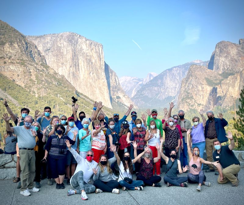 group of people posing at yosemite