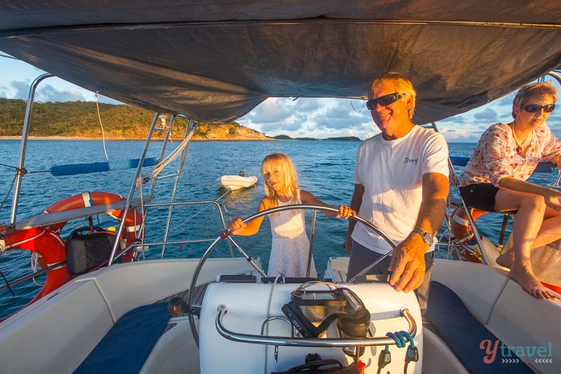 people driving a boat