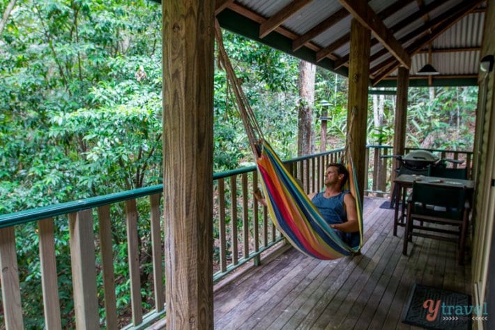 man laying on a hammock 