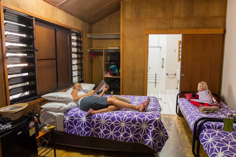 mother and child lying on beds inside Cape Trib Beach House a