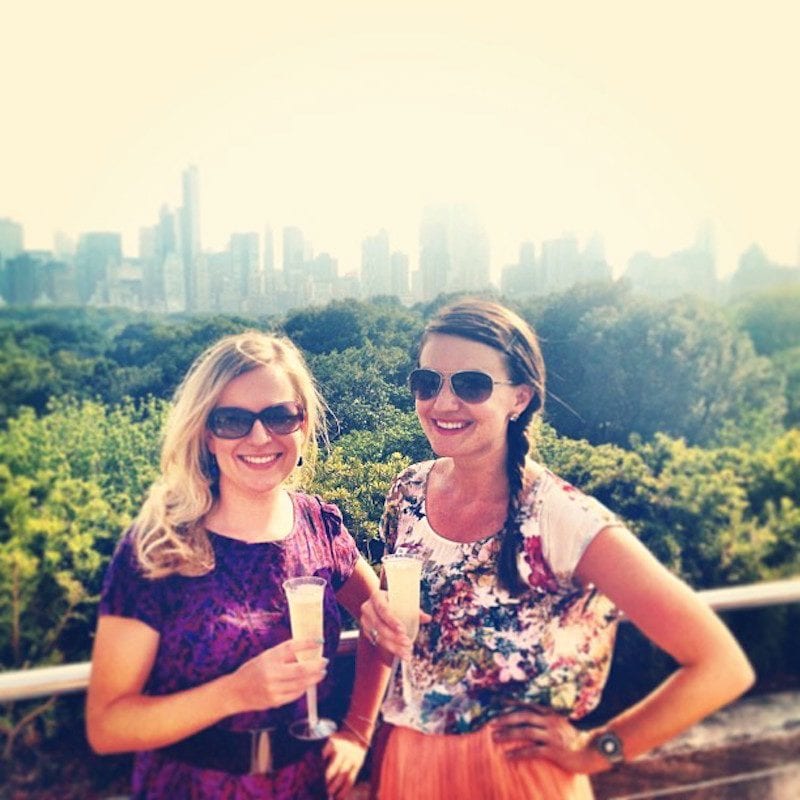 girls enjoying a champagne on Met Roof Top Bar, New York City with skyline views