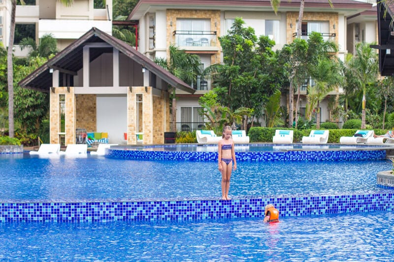 girls in swimming pool of movenpick resort