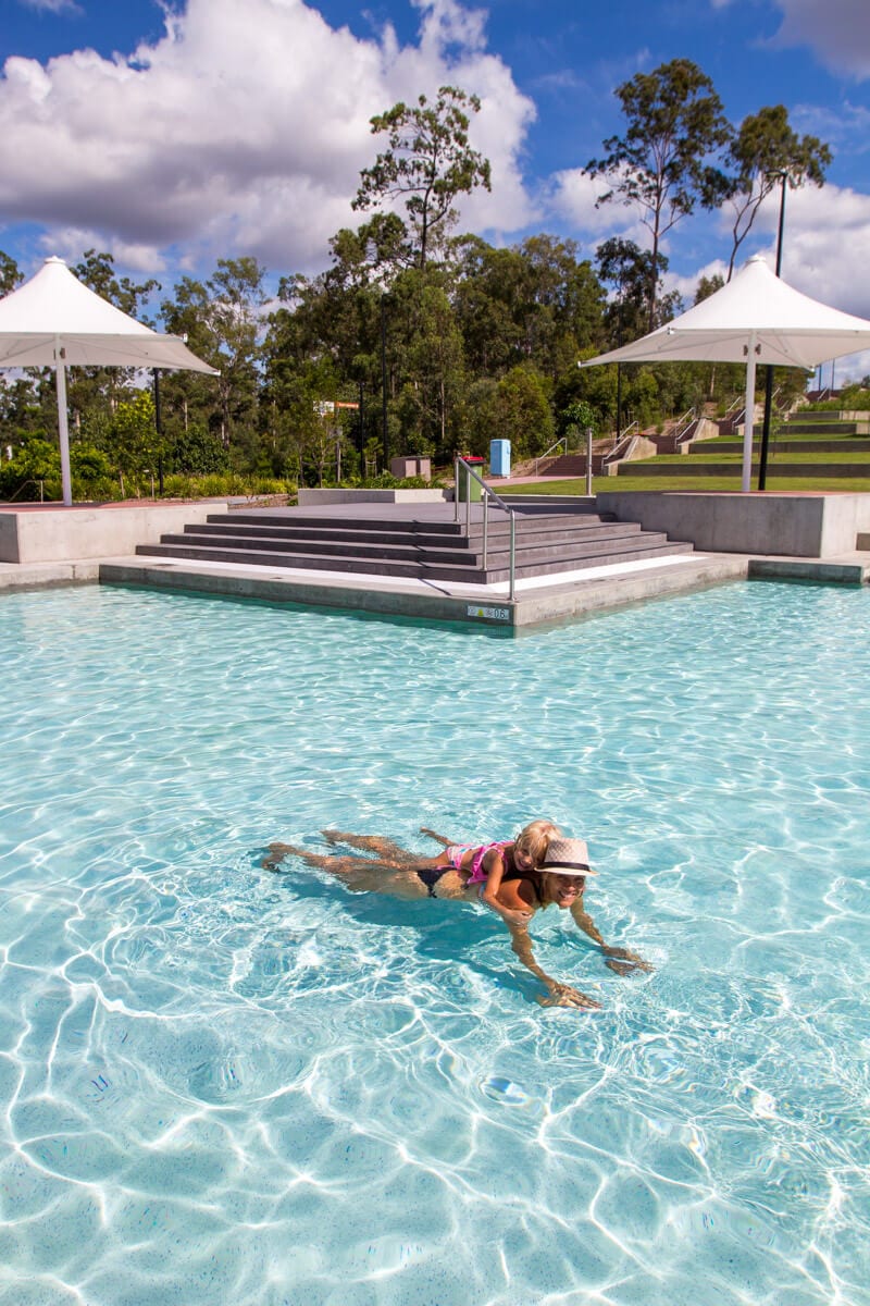 mother and child swimming at orion lagoon pool