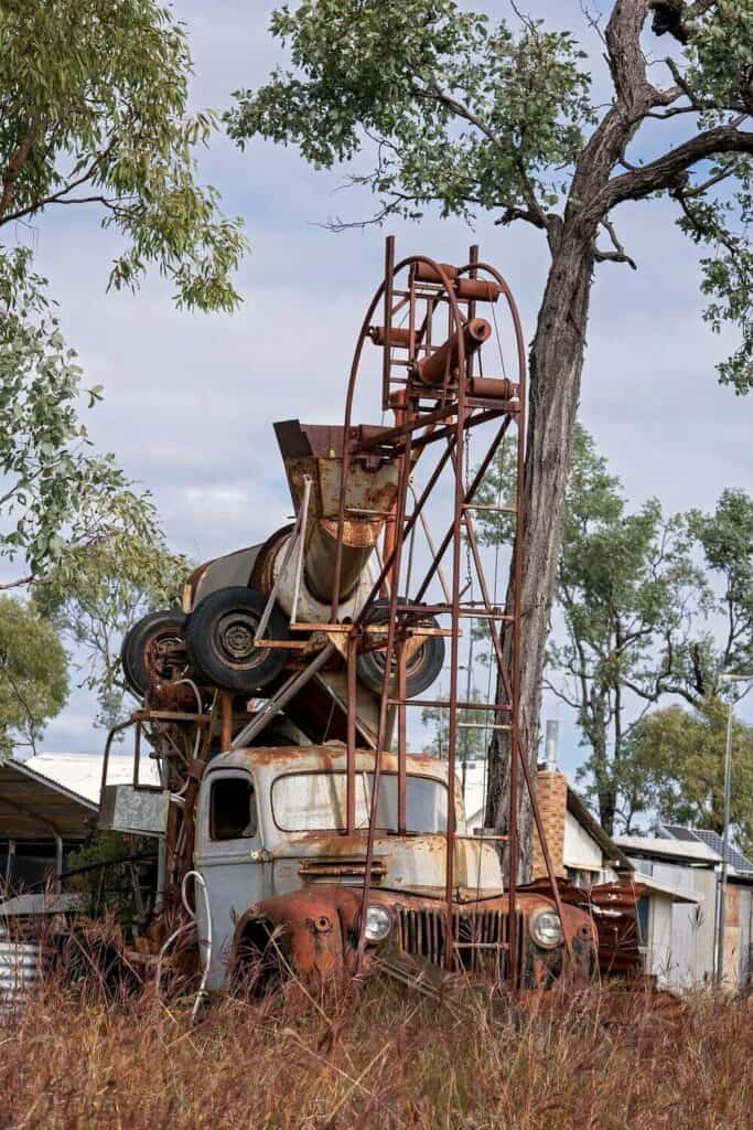 rusted ute and mine equipment