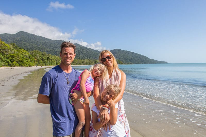 family posing on Cape Tribulation Beach