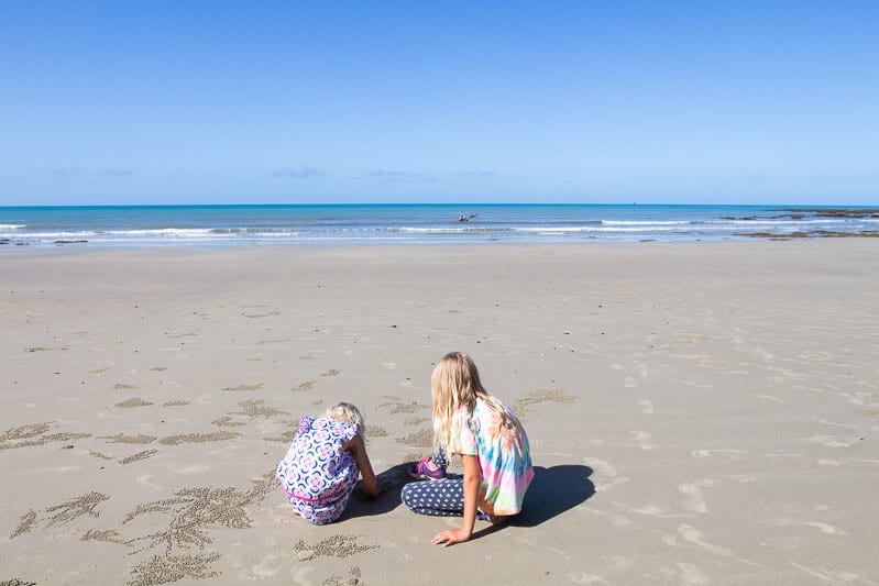 girls playing on Cape Tribulation Beach