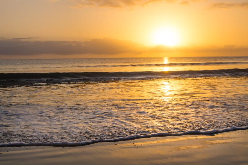 Sunrise over Cape Tribulation Beach in the Daintree Rainforest of Queensland, Australia