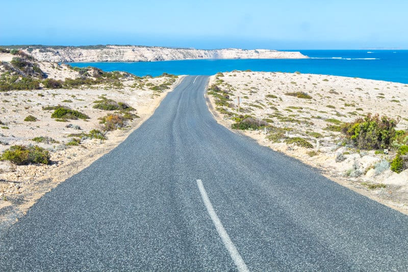 road leading to water