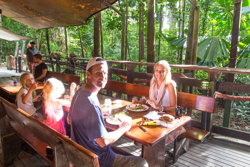 family eating at outside restaurant at Cape Trib Beach House 