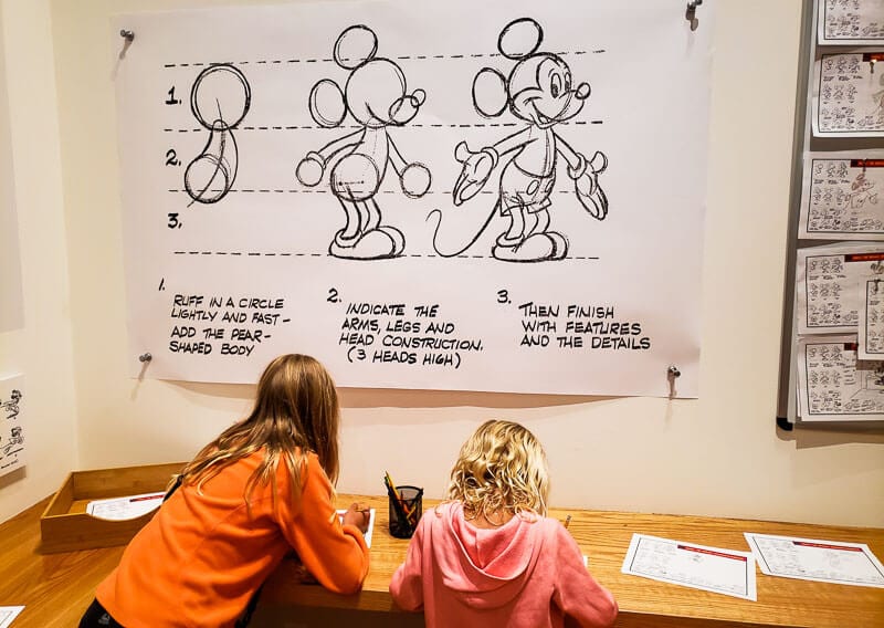 kids drawing at the disney museum