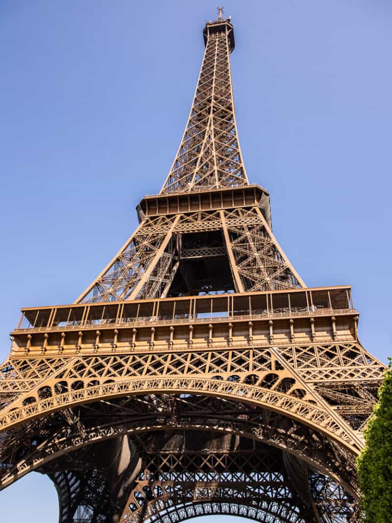 looking up at the eiffel tower