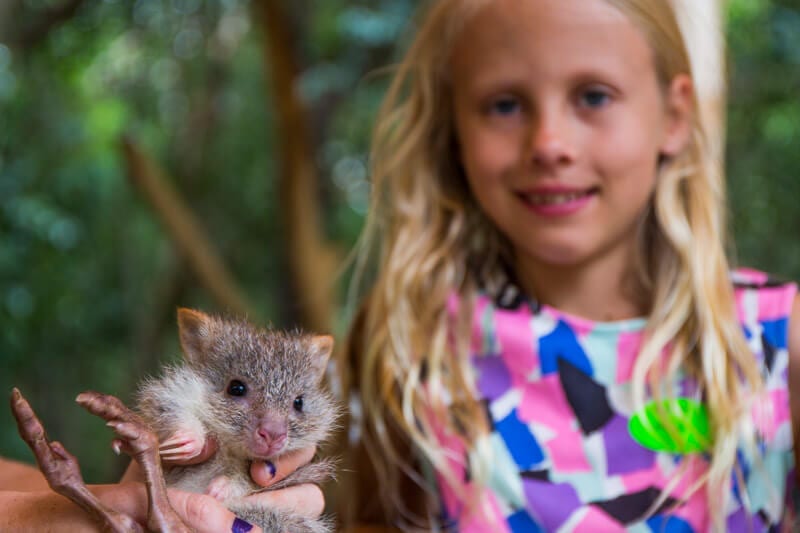 girl with small animal