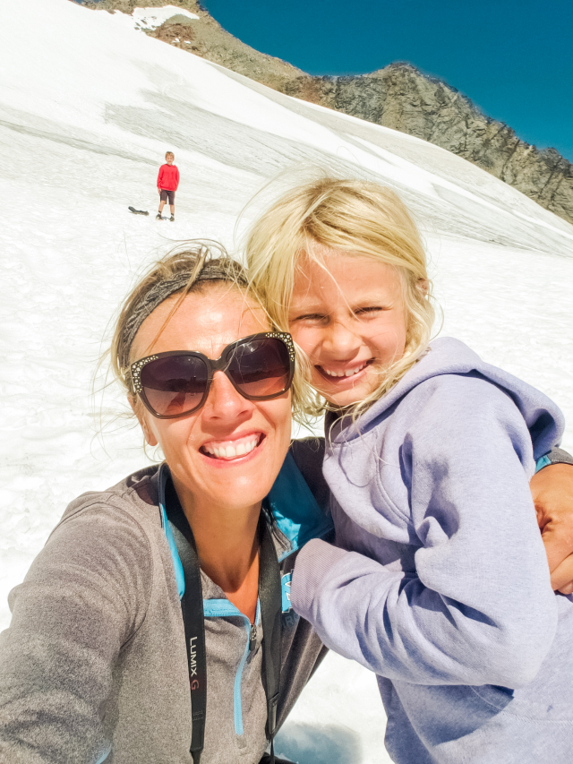 mother and child taking selfie on sahale glacier north cascades np