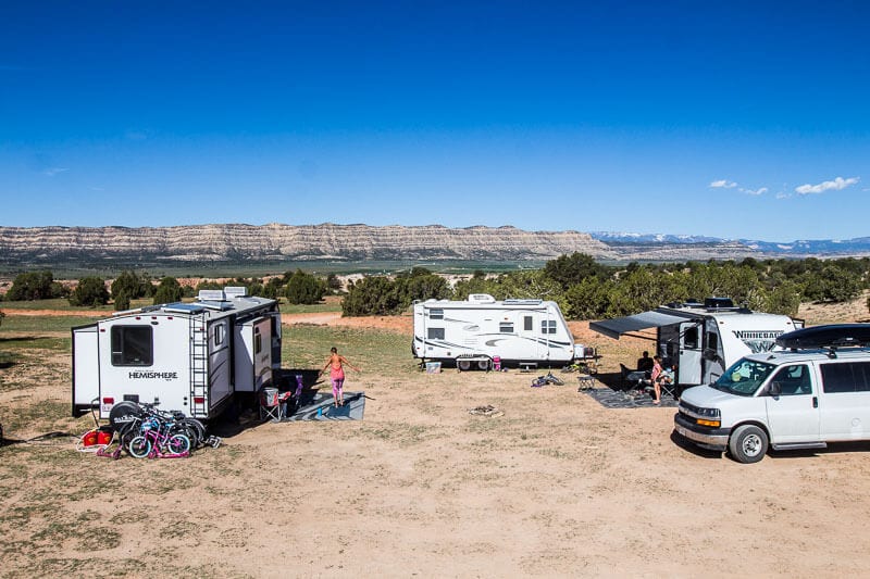 caravans in a dirt field