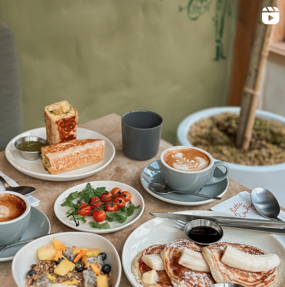 breakfast spread on table with coffee