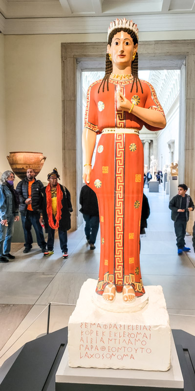 orange statue in met