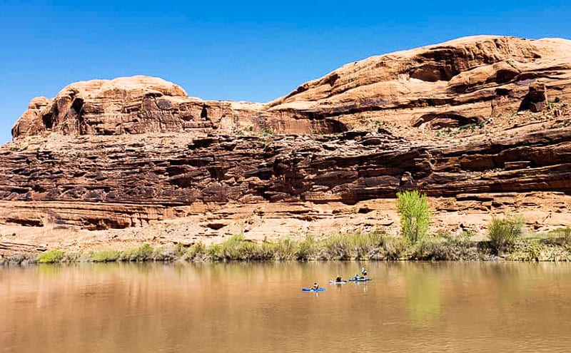 people Kayaking the Colorado River in Moab