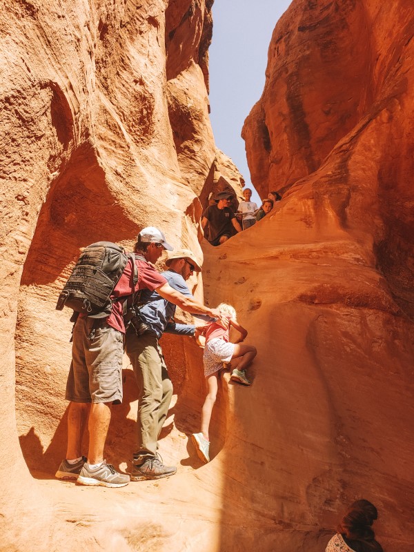 children climbing up peek-a-boo canyon grand staircase escalante (2)