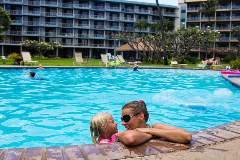 family Relaxing in the poolside at Kaanapali Beach Hotel