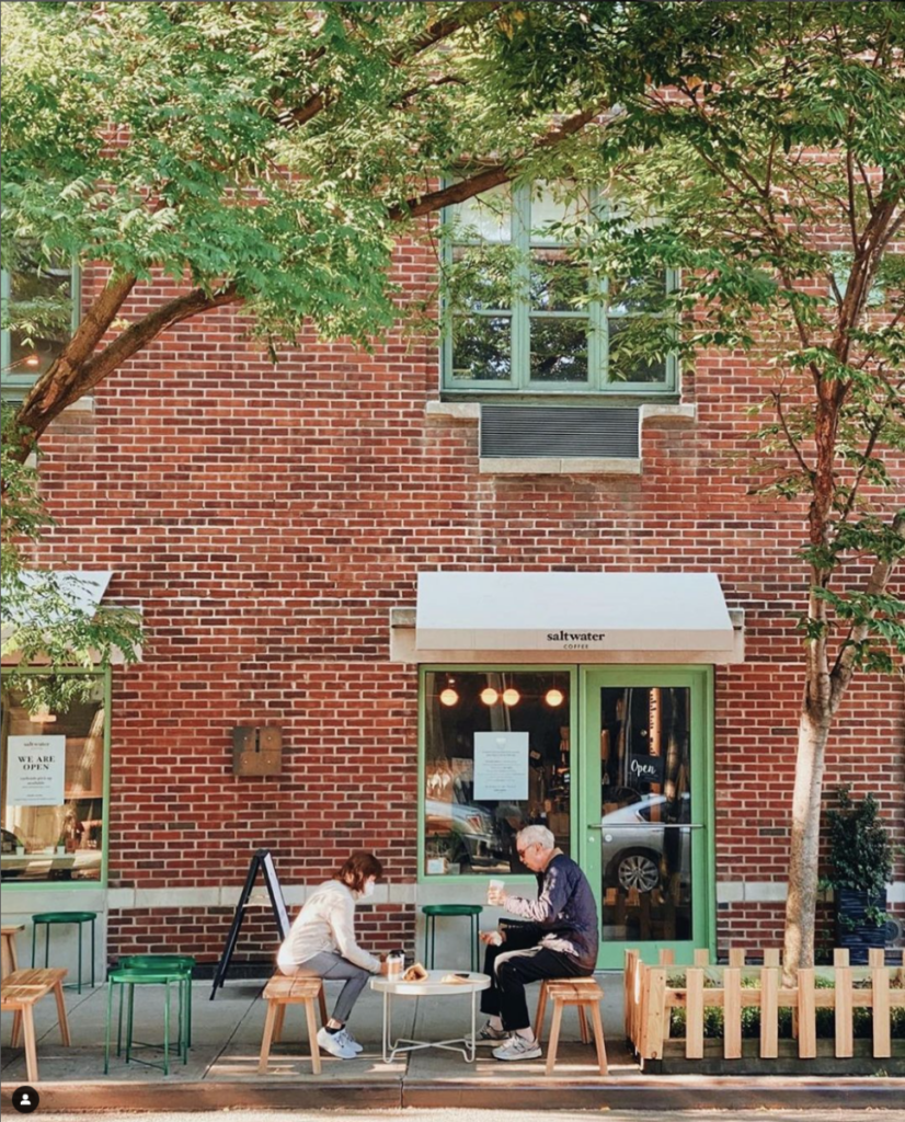 people sitting outside saltwater coffee in west village