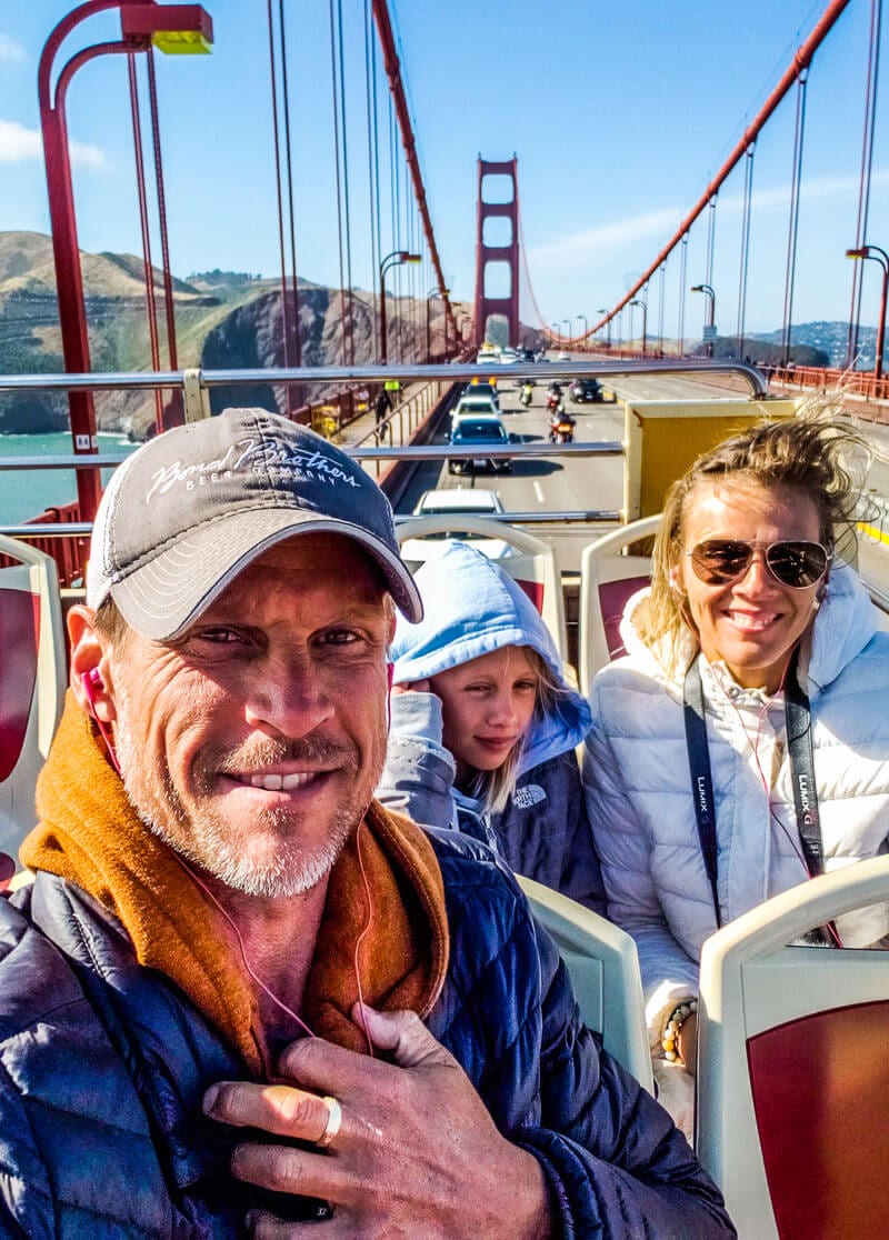 family on the Hop on hop off bus on golden gate bridge