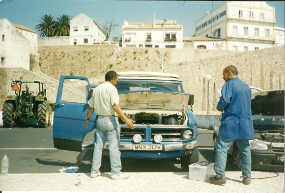 mechanic looking at campervan engine