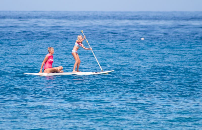 mother and child Stand up paddle boarding at Kaanapali Beach, Maui