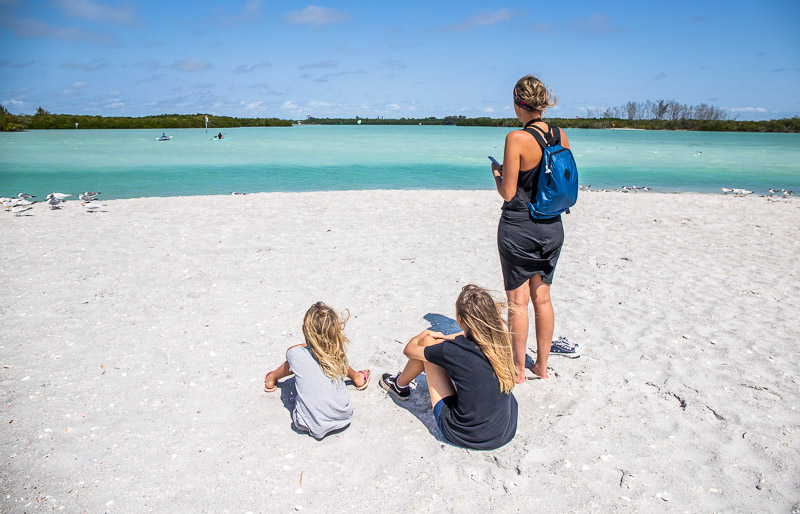 people sitting on the beach at stumps pass